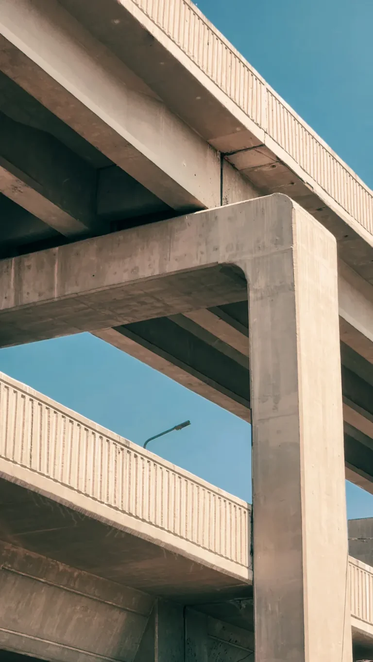 Concrete road overpass against a blue sky