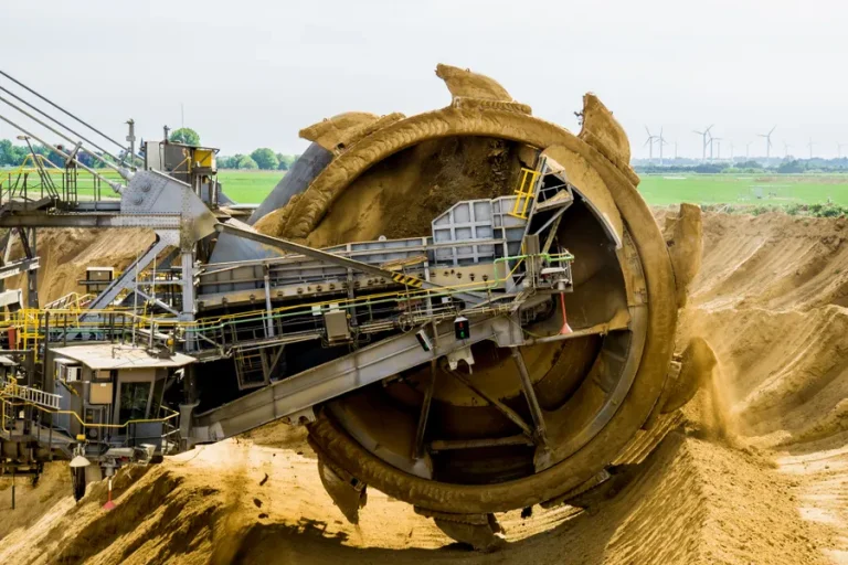 Bucket-wheel excavator operating in an open-pit mine
